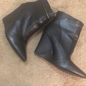 Black wedge booties